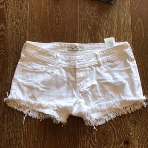 White Jean shorts with cute detailing on bottom